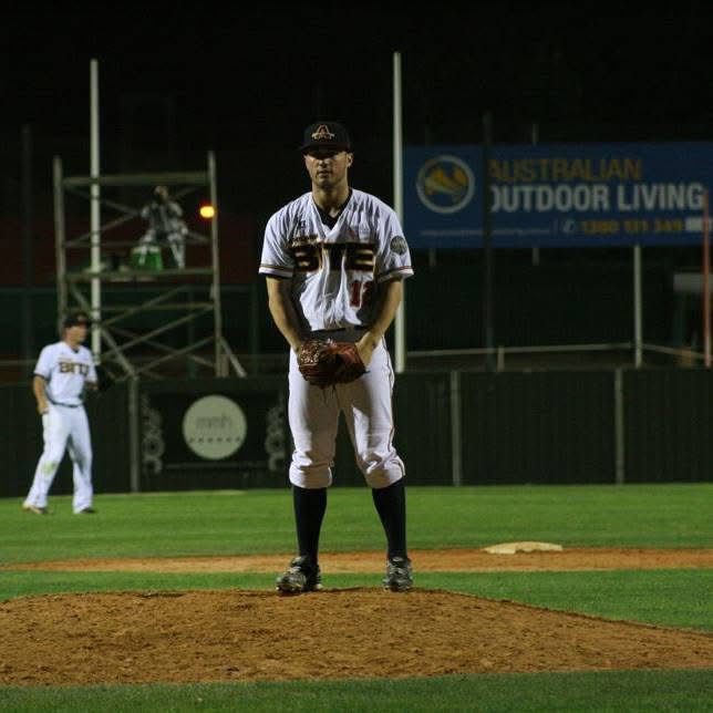 Colin Feldtman pitching for the Adelaide Bite in the Australian Baseball League before becoming a strength and conditioning coach in Tigard, Oregon