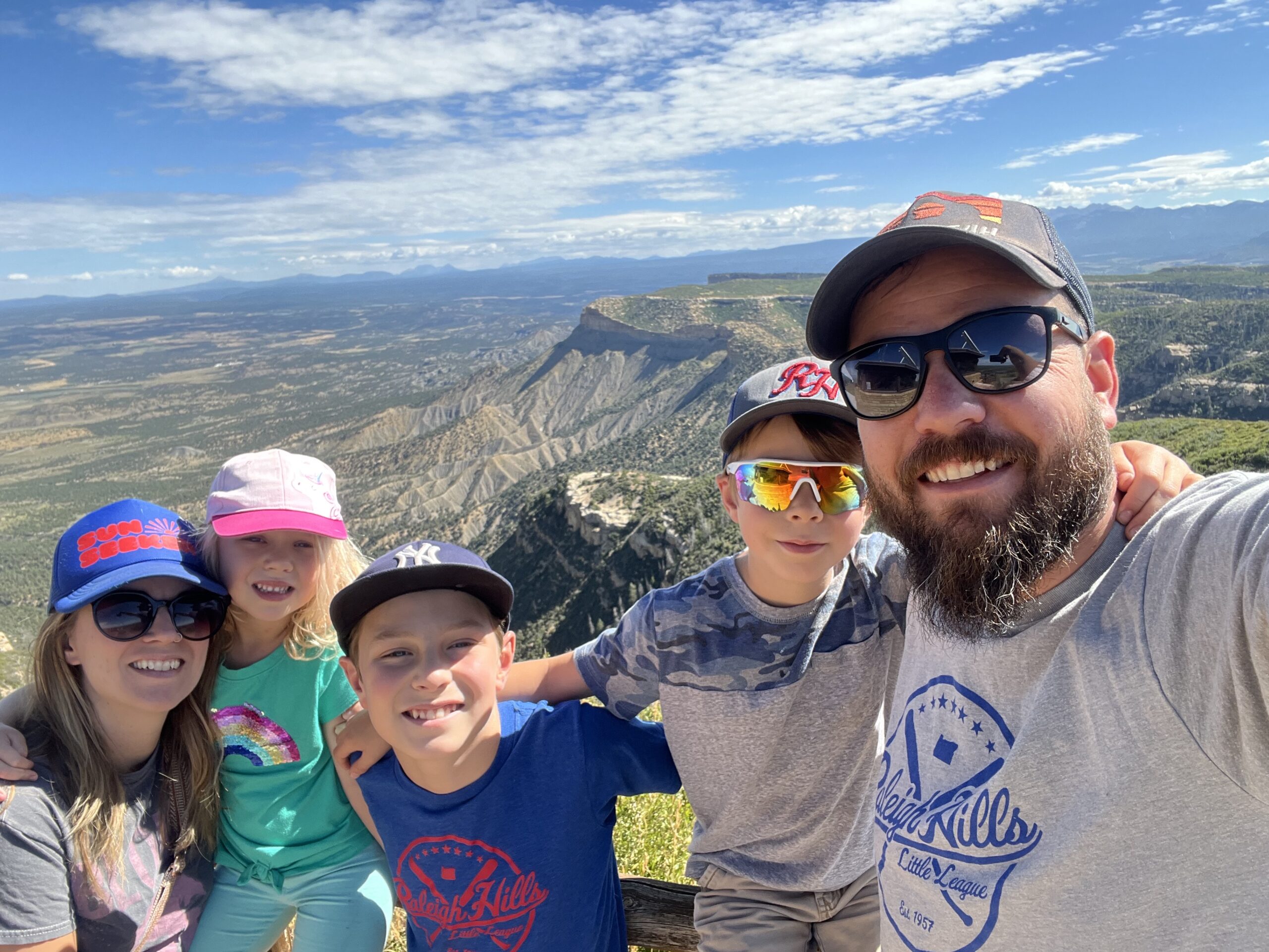 Eric and Annie Wise with their three children at a high-elevation mountain overlook, an example of how strength training at APEX PWR Tigard supports active family adventures