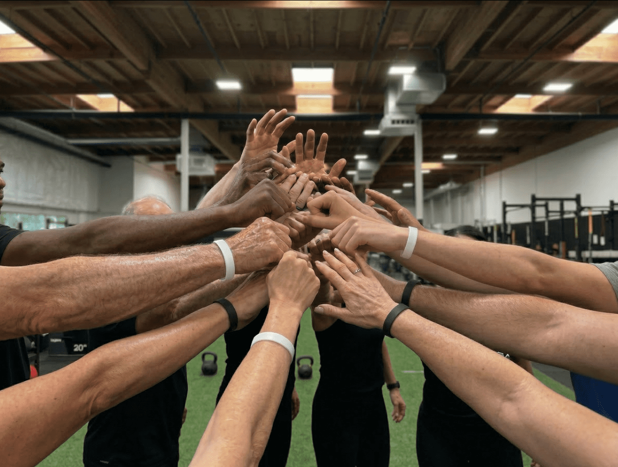APEX PWR coaching and physical therapy team on the turf in Tigard, Oregon
